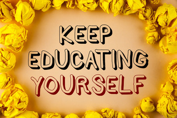 Text sign showing Keep Education Yourself. Conceptual photo never stop learning to be better Improve encourage written plain background within Yellow Paper Balls.