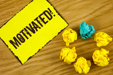 Handwriting text Motivated Motivational Call. Concept meaning Willing to do something Inspired...