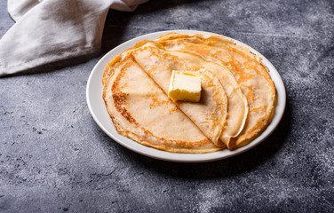 Pancakes crepes on dark background