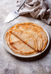 Pancakes crepes on light background