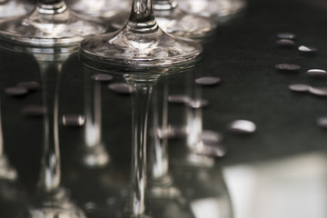 Reflection of glasses on club table at night