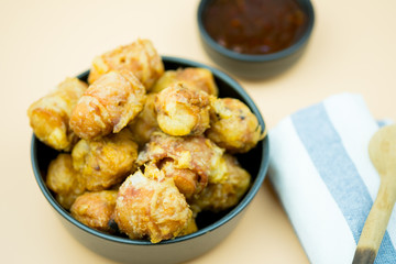 Fried meatballs is delicious in black bowl