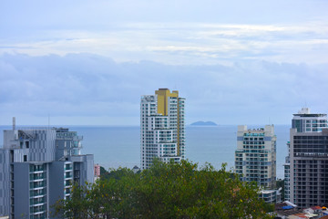 Looking from the height See a city in a tight city with tall buildings and beautiful skies. Is a comfortable view