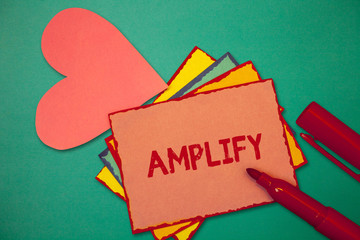 Text sign showing Amplify. Conceptual photo Make something bigger louder increase the volume using...