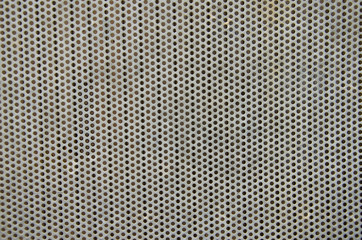  Abstract background. White perforated metal sheet