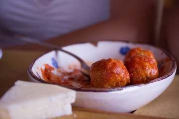 Close Up of Italian Traditional Food Called Polpette col Sugo, Made with Cheese, Meat and Tomato
