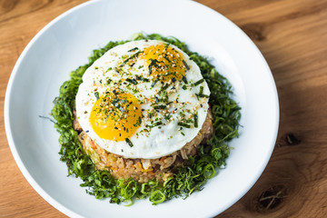Fried rice with eggs on top