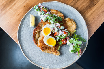 Eggs and meat on a plate