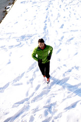 Fototapeta na wymiar Athlete man training at snow