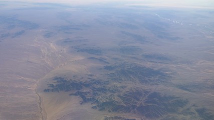 Aerial shot above mountains in 4k