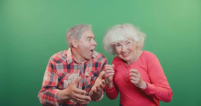 Funny old couple dancing
