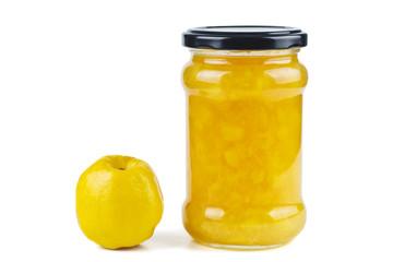 Glass jar with maules quince (Chaenomeles japonica) jam isolated on white background