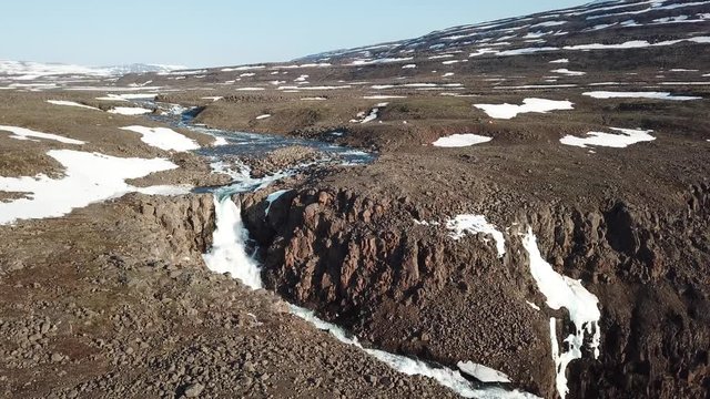 55-meter two-stage waterfall on the first right tributary of the Hikikal river, Putorana Plateau, Taimyr. Russia, Siberia
