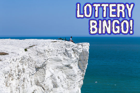 Text sign showing Lottery Bingo. Business photo text game of chance in which each player matches numbers printed - Powered by Adobe
