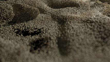 Golden Glitter Dust background. Golden pearls. Yellow loosened sand on ground.