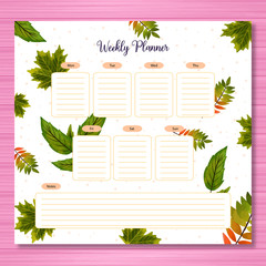 weekly planner with green autumn leaves