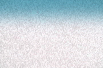  The texture of genuine leather.  Blue skin texture closeup. Colorful background with gradient.