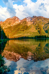 Morning Light on Mountains reflected in Lake