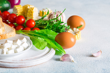 Ingredients for making breakfast of eggs with vegetables