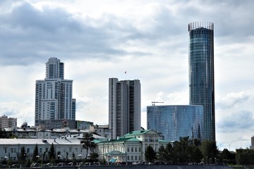 Fototapeta premium city: modern tall buildings and low houses