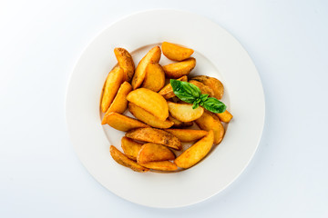rustic french fries slices on a light background