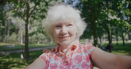 Senior lady dancing outdoors