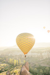 Panoramic view. Colorful hot air balloons flying over the valley at Cappadocia. Love Valley 