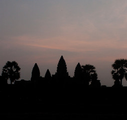 A silhouette of Angkor Wat temple during a sunrise near Siem Reap in Cambodia