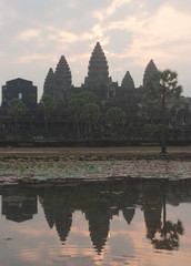 Fototapeta premium A sunrise with UNESCO Angkor Wat Temple reflection near Siem Reap in Cambodia