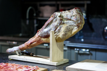 jamon on a wooden stand