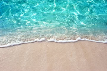  Soft blue ocean wave or clear sea on clean sandy beach summer concept © OHishi_Foto