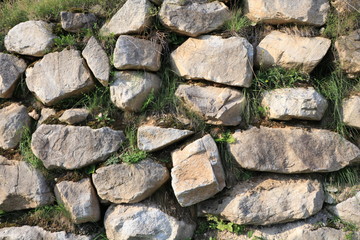 old stone wall of stones texture