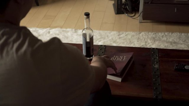 Depressed man chooses alcohol instead of bible