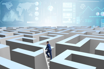 Businessman trying to escape from maze