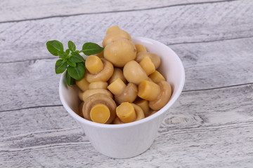 Pickled champignon heap in the bowl