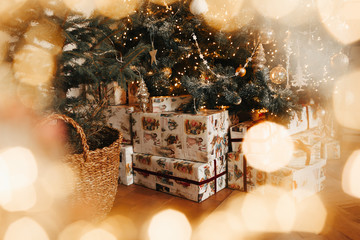 Luxury warm and cozy evening in Christmas room interior design, Xmas tree decorated by gifts,...