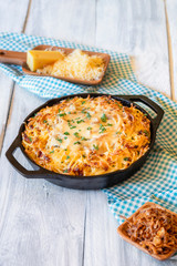 German traditional pasta dish in iron cast tray