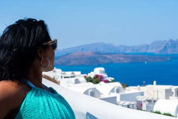 Fototapeta na wymiar Woman On Vacation In Santorini