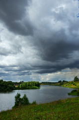 Obraz premium clouds over the river