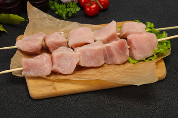 Raw pork meat skewer for grill