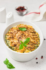 Zucchini cheesy casserole.Selective focus, copy space.
