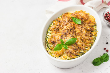 Zucchini cheesy casserole.Selective focus, copy space.
