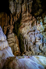 Walls covered with stalactites and stalagmites inside the cave 5