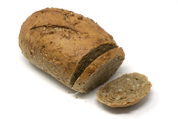 a yummy french cereals bread sliced on a white background