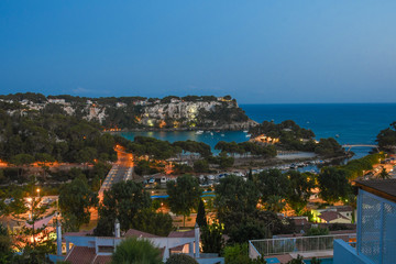 Naklejka premium Panoramic view of Cala Galdana dusk in Menorca