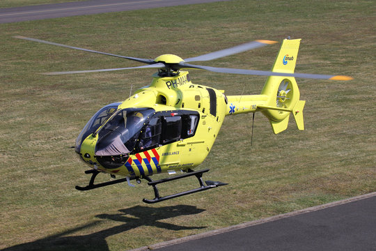 SANKT AUGUSTIN, GERMANY - APRIL 9, 2015: ANWB Medical Air Assistance Eurocopter EC-135T2+ with registration PH-MAA departing after maintenance at Bonn Hangelar Airport.