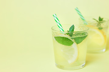 Lemonade or mojito cocktail with lemon and mint