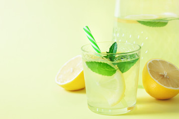 Lemonade or mojito cocktail with lemon and mint
