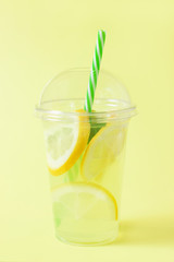 Lemonade or mojito cocktail with lemon and mint