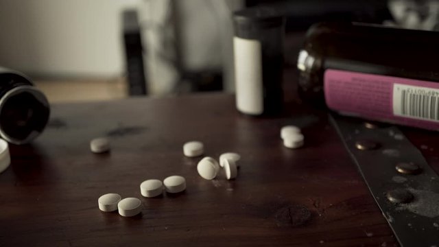 4K Frantic addict man grabbing pills to get high with prescription painkillers